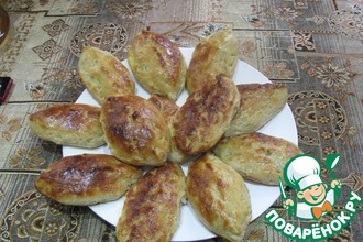 Закусочные пирожки с рыбой и солеными огурцами