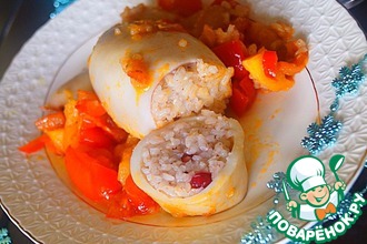 Кальмары, фаршированные рисом и гранатом