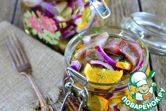 Сельдь с лимонами в масле