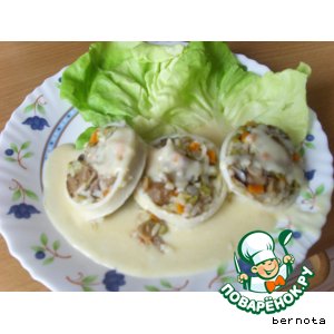 Фаршированые кальмары с соусом бешамель