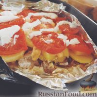 Мясо с картофелем и помидорами