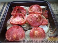 Карп, запеченный с овощами